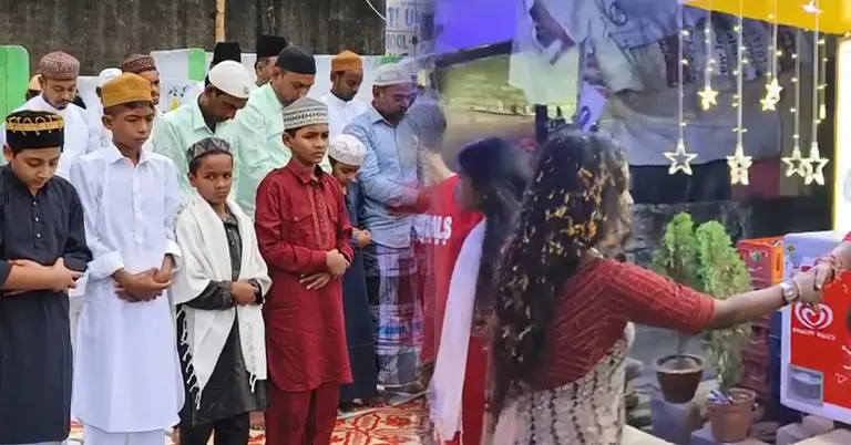 নামাজ পড়ছেন ও ভোটের প্রচারণা চলছে